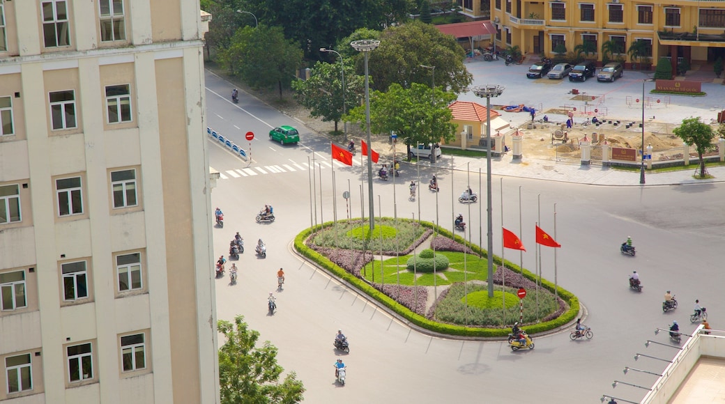 Hue City Centre featuring a garden and motorbike riding as well as a small group of people