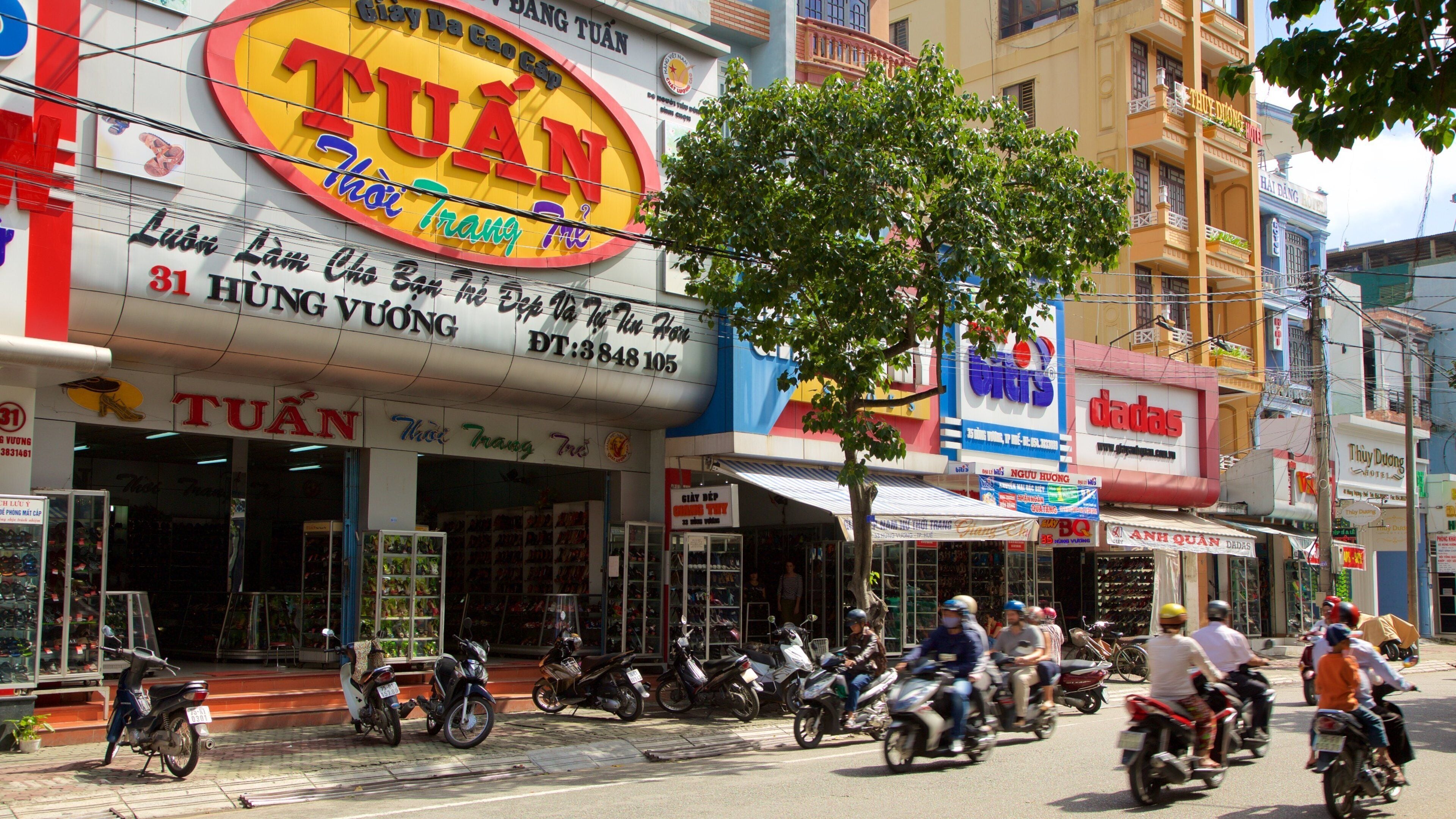 Hue City Centre which includes signage, a city and street scenes