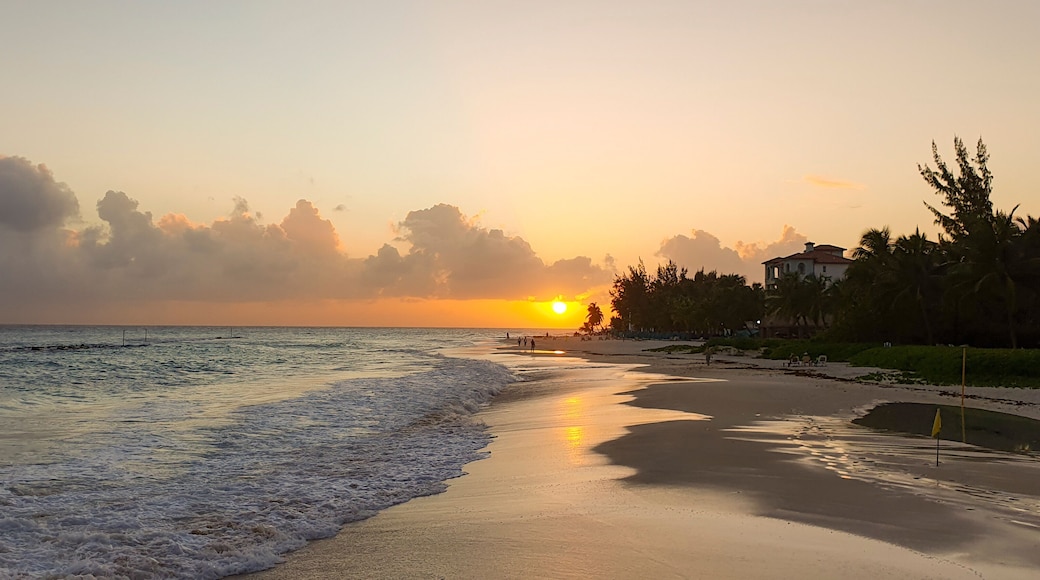 Sunset on Maxwell beach Barbados, in the evening.