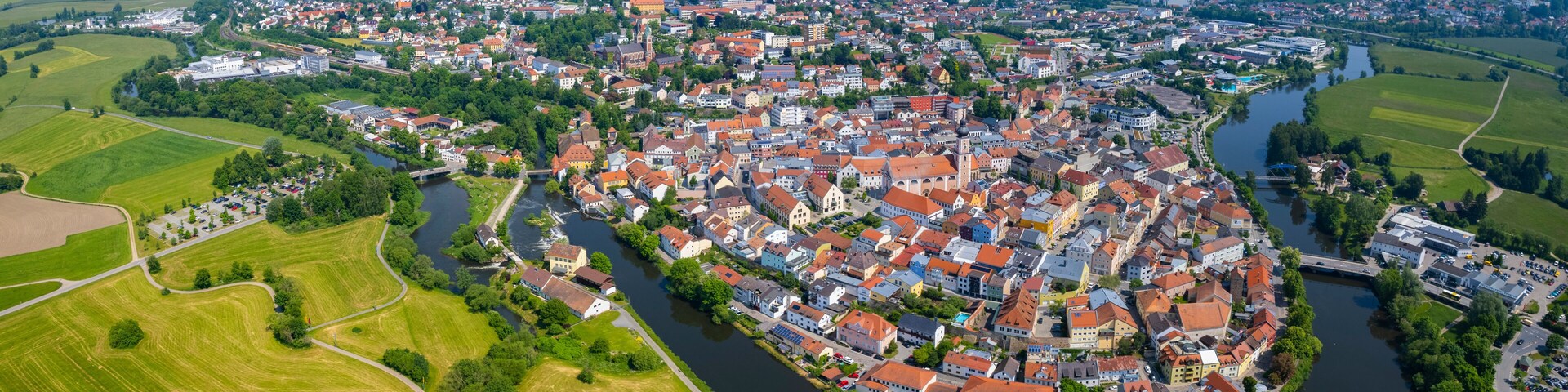 Aerial panoramic view of the city Cham in Germany, Bavaria on a sunny spring afternoon.