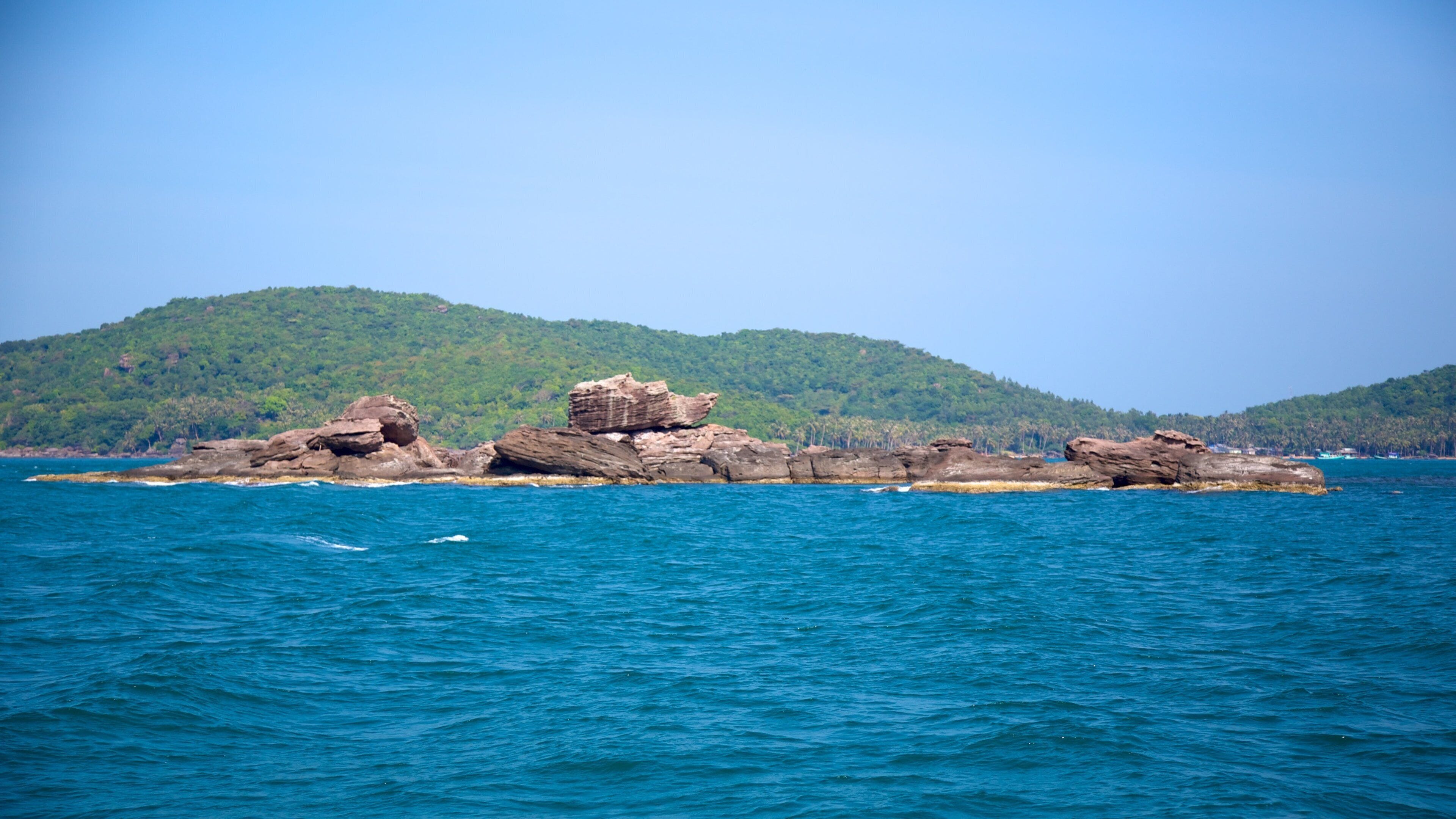 Phu Quoc featuring rocky coastline and general coastal views