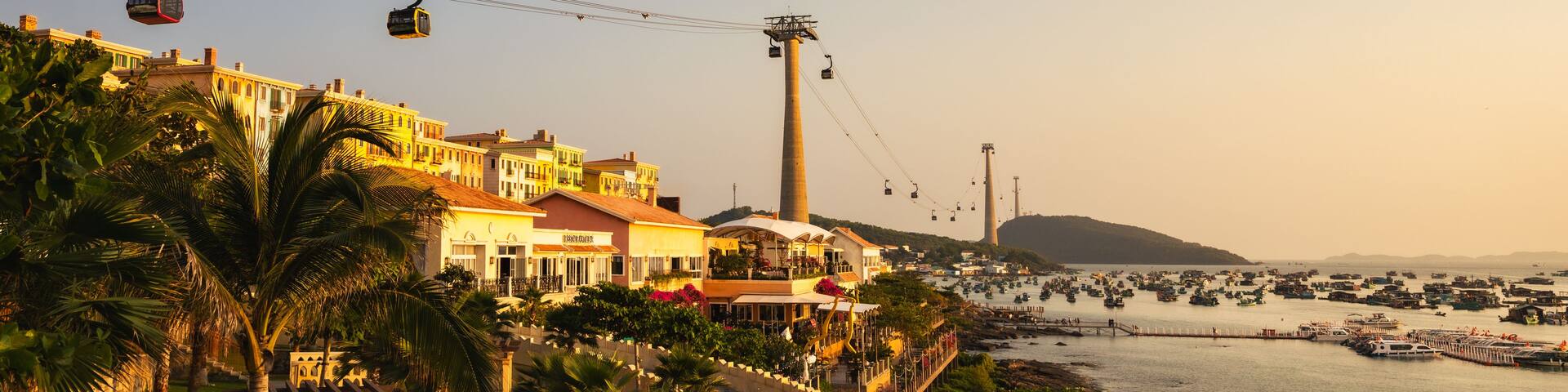 The cable car transports across the island. Panorama of Sunset town in Phu Quoc city Vietnam's new tourist city