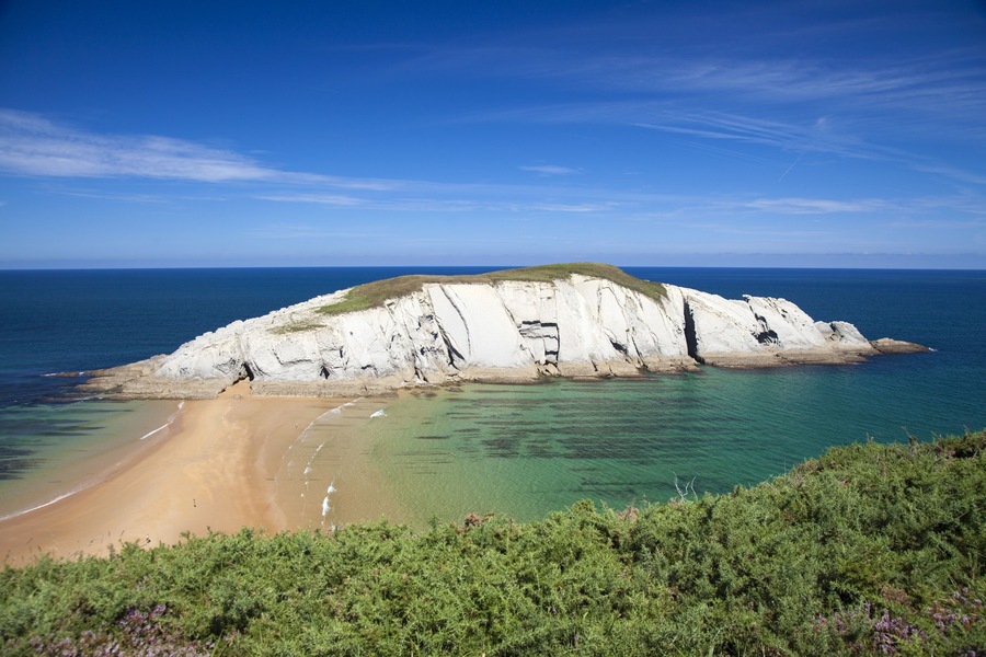 spectacular beach Playa de los Covachos, Cantabria, green belt of Spain