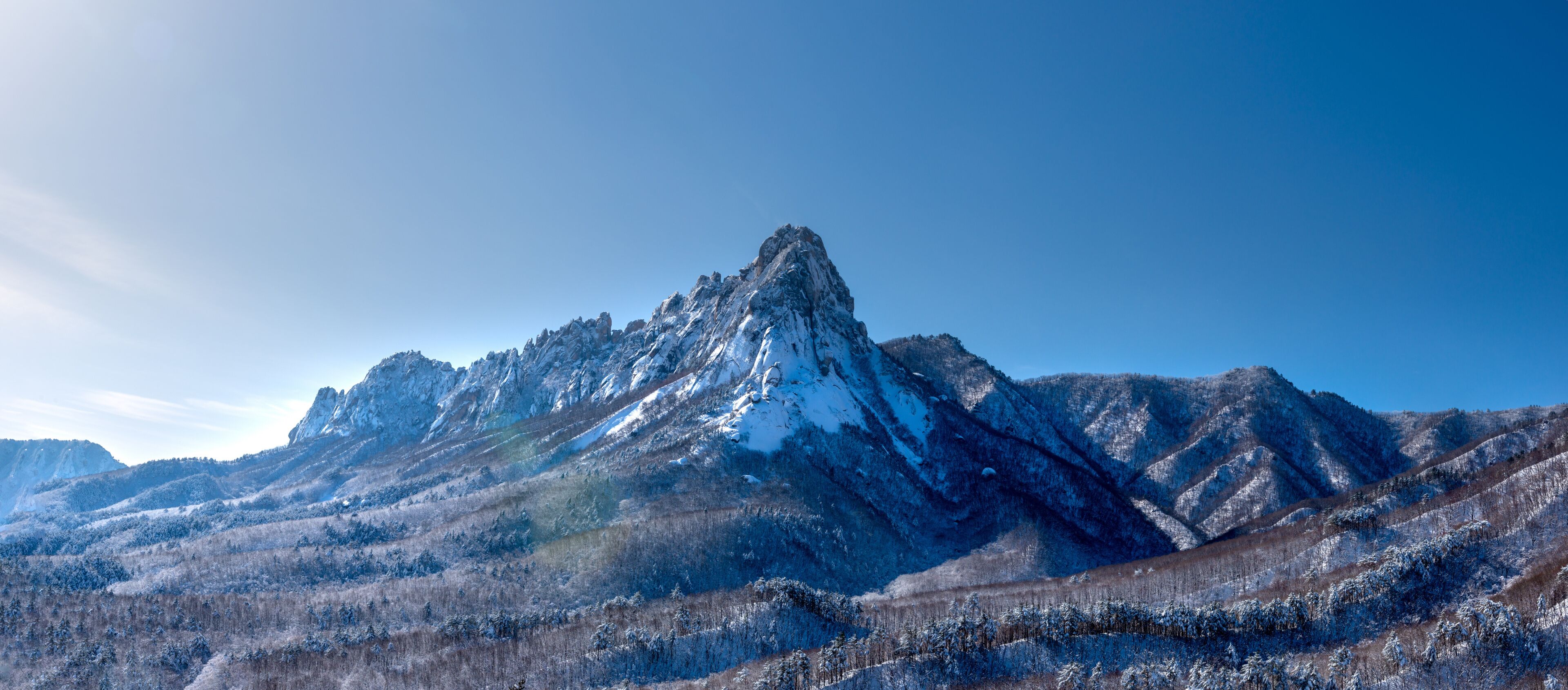 Panoramic view of snow covered Ulsanrock at Seoraksan Mountain near Goseong-gun, South Korea