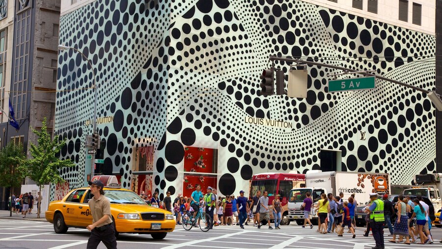 5th Avenue showing street scenes, modern architecture and a city