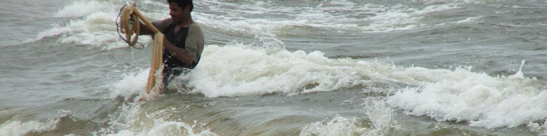 Fishing off the beach at waikkal
