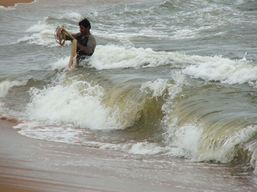 Fishing off the beach at waikkal