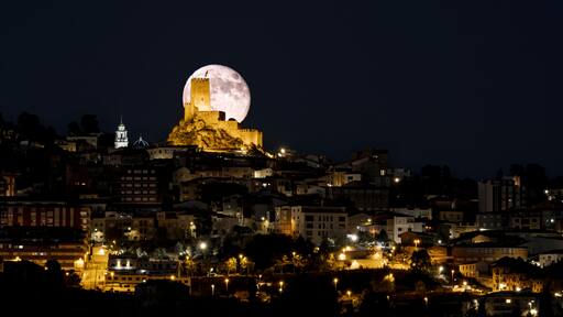 Moonrise of a full moon over Banyares Castle in Sierra Mariola, Alicante Province, Spain, Erope