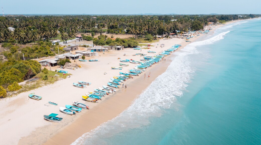 Aerial view of fishing boats on Nilaveli beach, Sri Lanka, for tourism