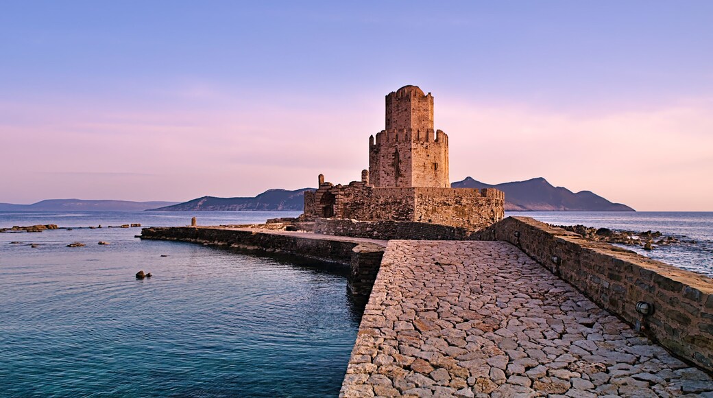Impressive three-tiered watchtower, Venetian fort castle of Methoni, Greece at sunset time.