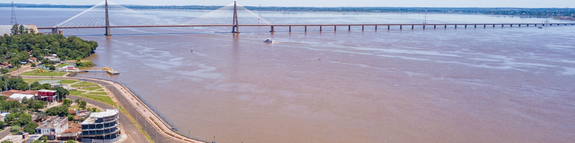 Aerial view of Encarnacion in Paraguay overlooking the bridge to Posadas in Argentina.