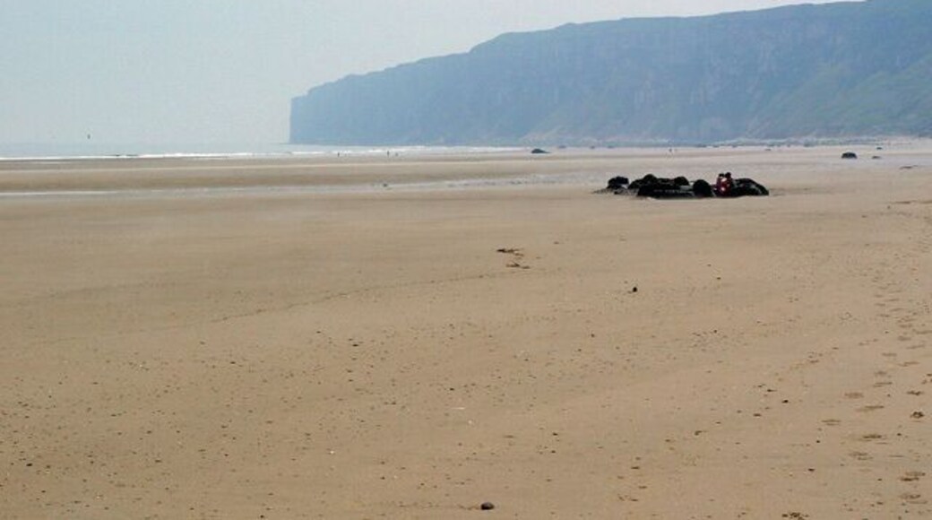 Speeton Sands, Speeton, North Yorkshire, England. Looking southeast Bempton Cliffs, Bempton, East Riding of Yorkshire, form the headland, Flamborough being hidden "round the corner".