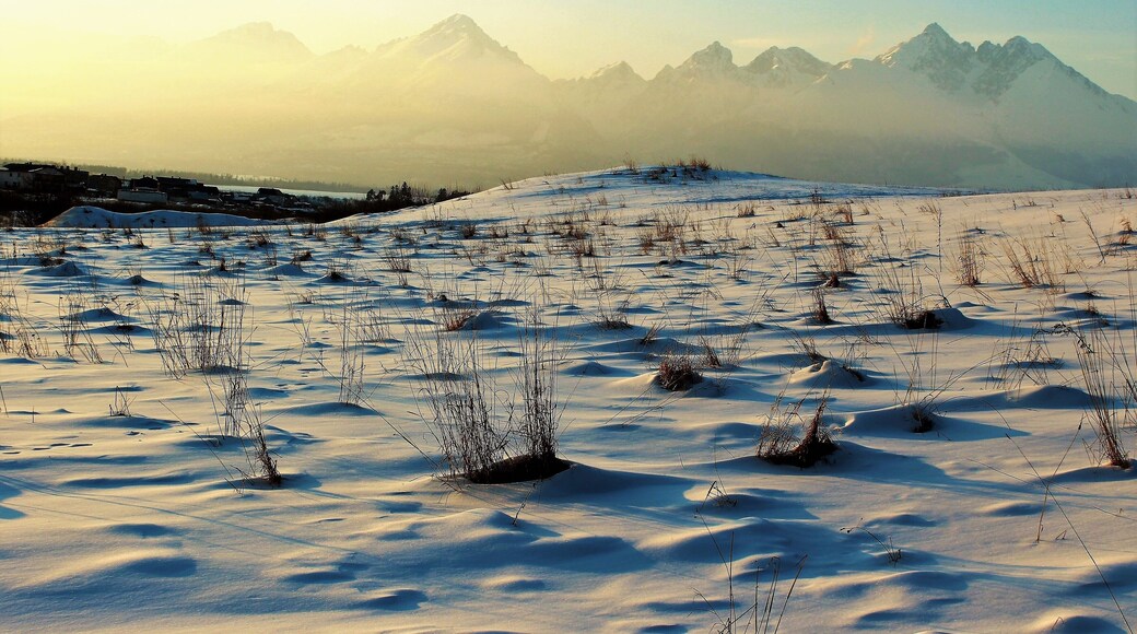 High Tatras Mountains at sunset! This was taken from the village of Veľká Lomnica. I was heading back to Poprad and decided to get out at the Studený potok station. As the mountain views were breathtaking. And had to get a closer look and take many photos! I walked some in the thick snow, getting as good of views as I could! They were epic views! And one of my favorite moments in Slovakia!