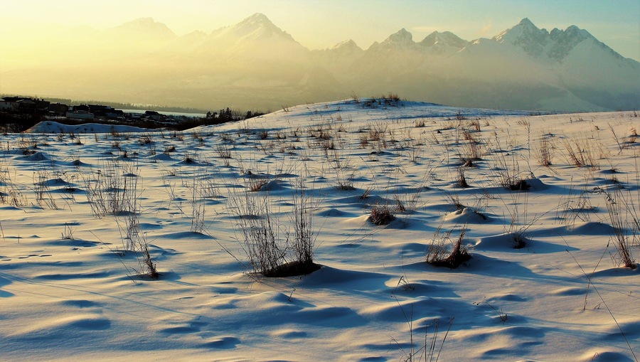 High Tatras Mountains at sunset! This was taken from the village of Veľká Lomnica. I was heading back to Poprad and decided to get out at the Studený potok station. As the mountain views were breathtaking. And had to get a closer look and take many photos! I walked some in the thick snow, getting as good of views as I could! They were epic views! And one of my favorite moments in Slovakia!