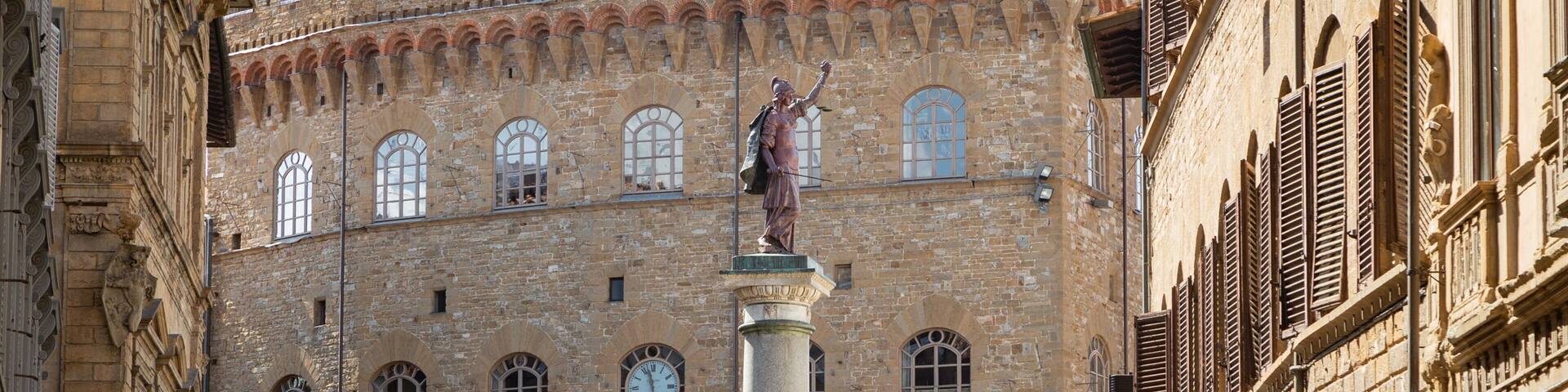 Via de\' Tornabuoni which includes heritage architecture and a statue or sculpture