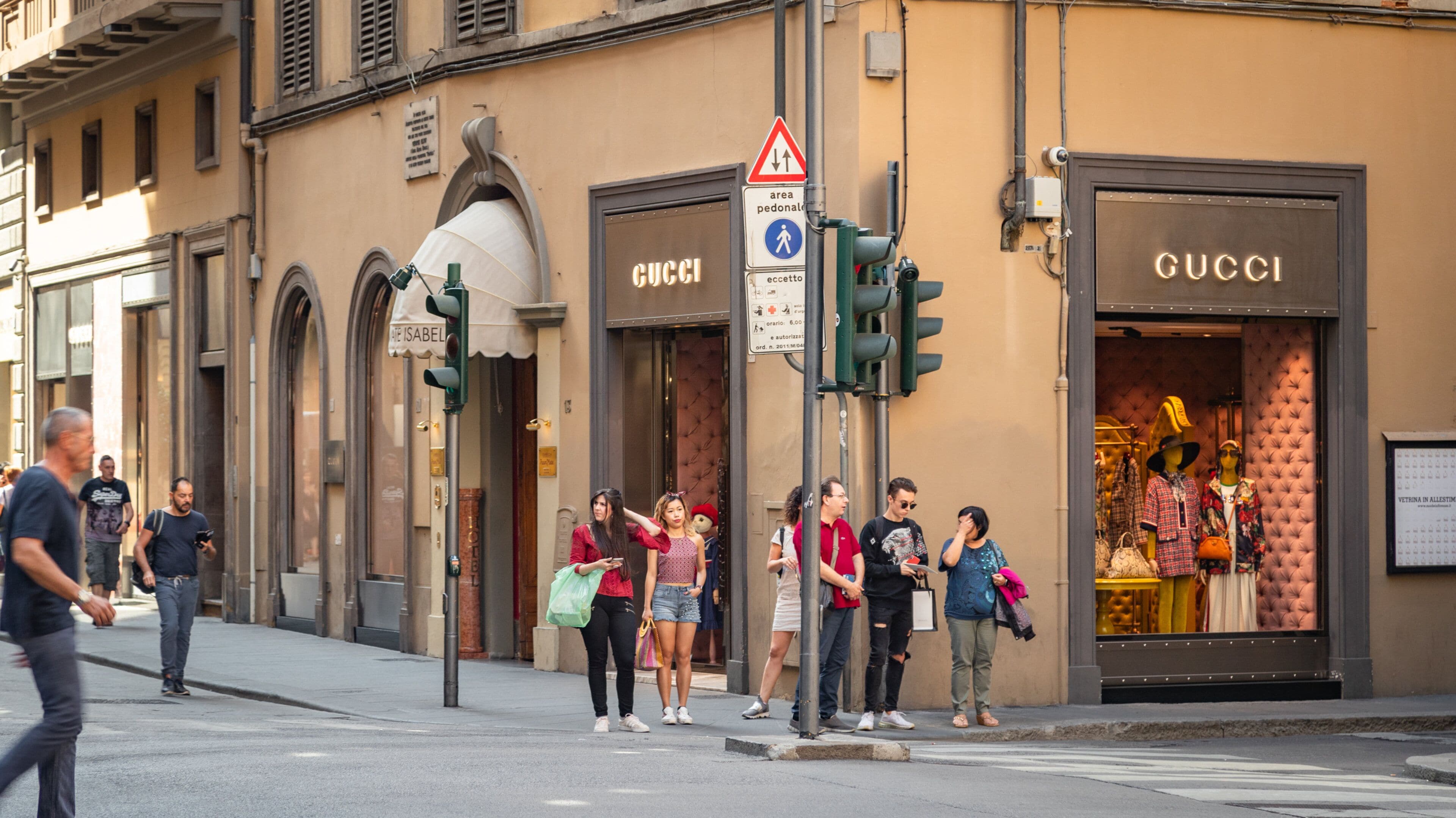 Via de\' Tornabuoni featuring street scenes as well as a small group of people
