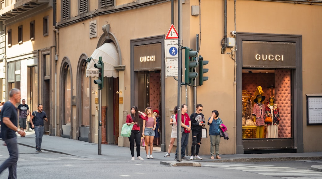 Via de\' Tornabuoni featuring street scenes as well as a small group of people
