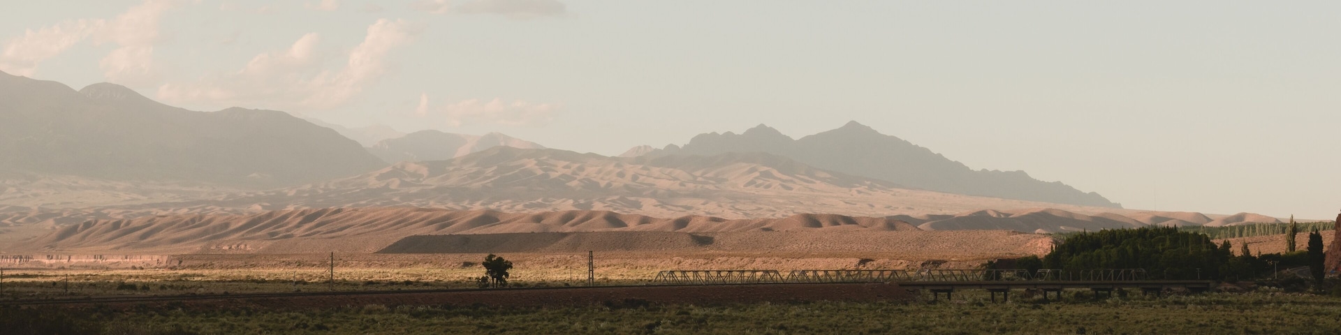 Rolling hills in the arid Uspallata, in Mendoza, Argentina. Wide panoramic shot.