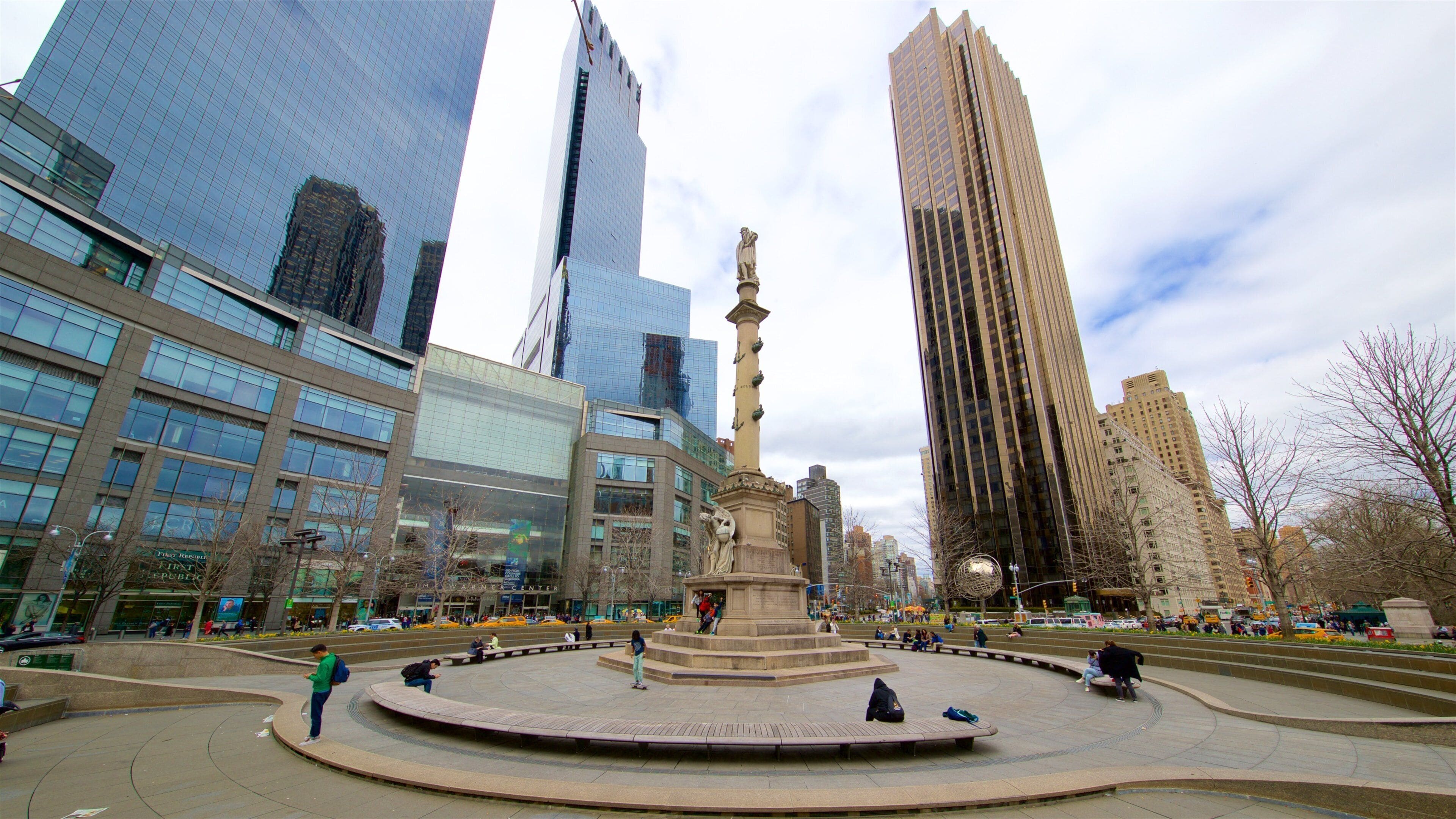 Columbus Circle featuring a city, a high rise building and a statue or sculpture