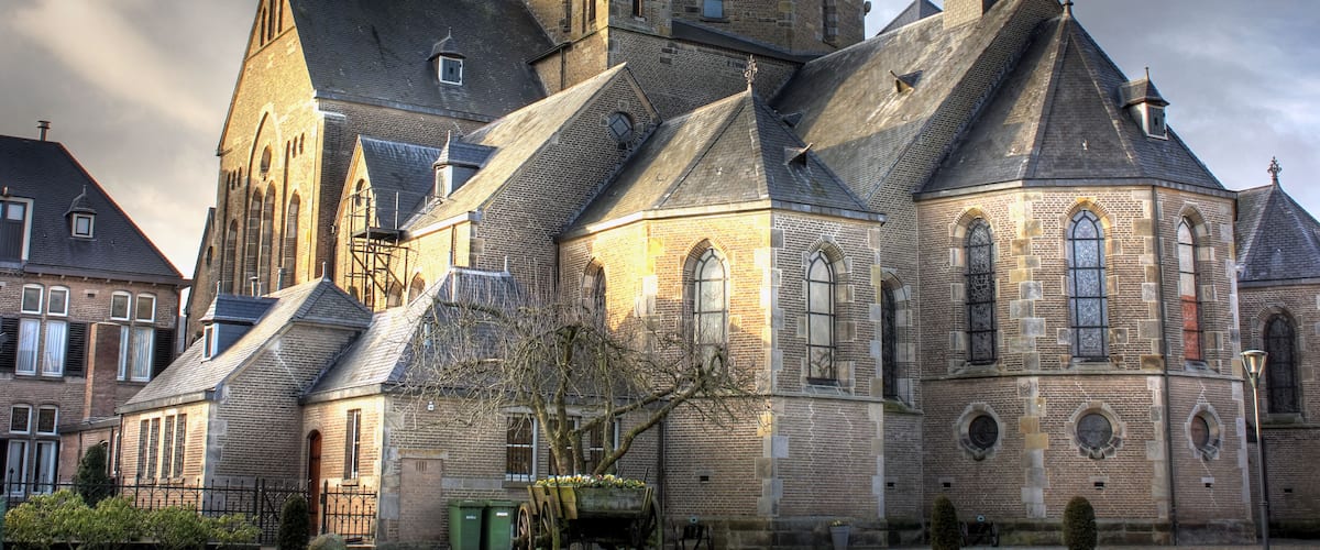 A historic church with multiple spires and a traditional stone facade.