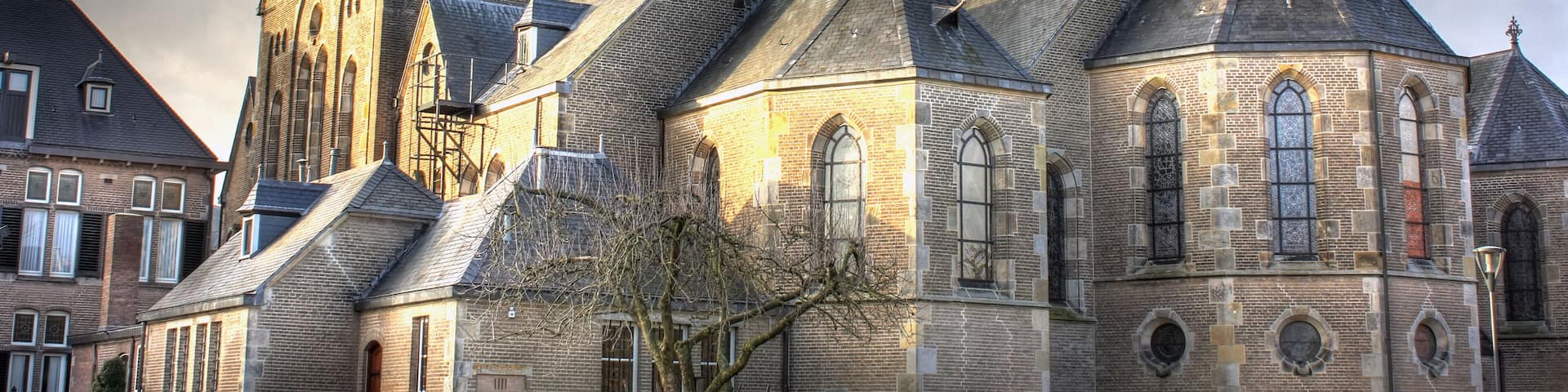 A historic church with multiple spires and a traditional stone facade.