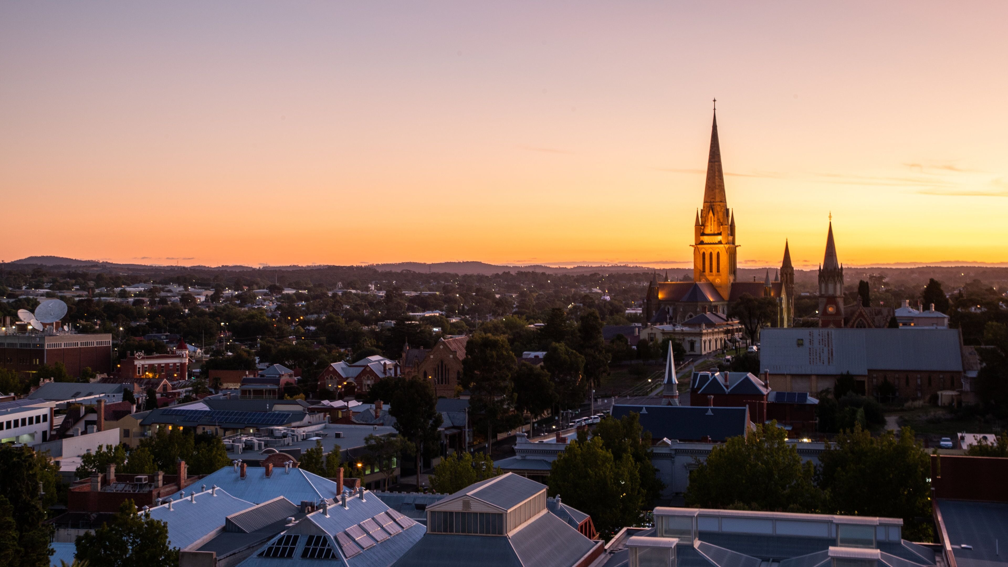 Rosalind Park which includes heritage architecture, landscape views and a sunset
