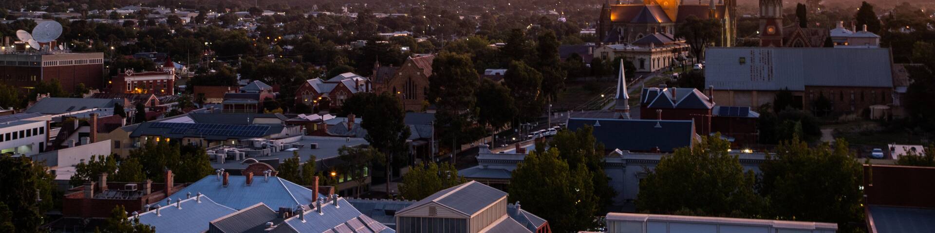 Rosalind Park which includes heritage architecture, landscape views and a sunset