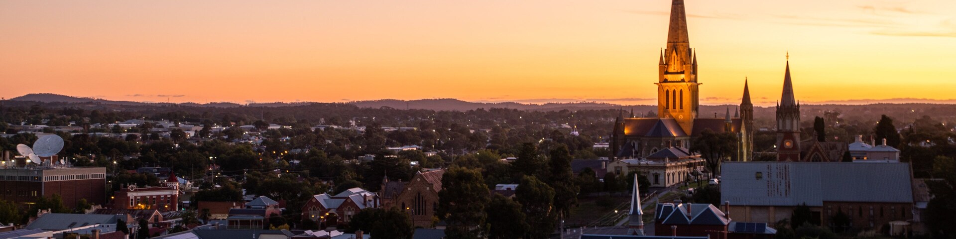 Rosalind Park which includes heritage architecture, landscape views and a sunset