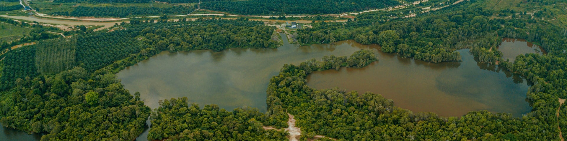 Aerial drone view of tropical scenery with dam lake at Jasin, Melaka, Malaysia