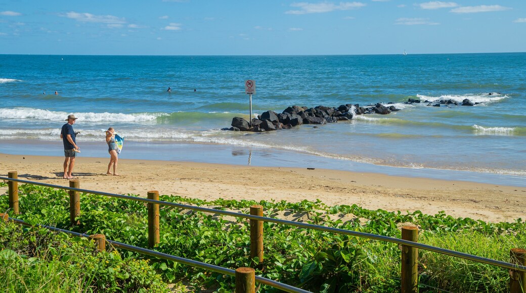 Bargara Beach which includes general coastal views and a sandy beach as well as a couple