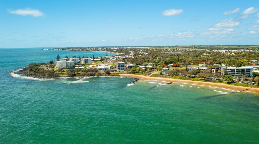 Bargara Beach showing landscape views, general coastal views and a coastal town
