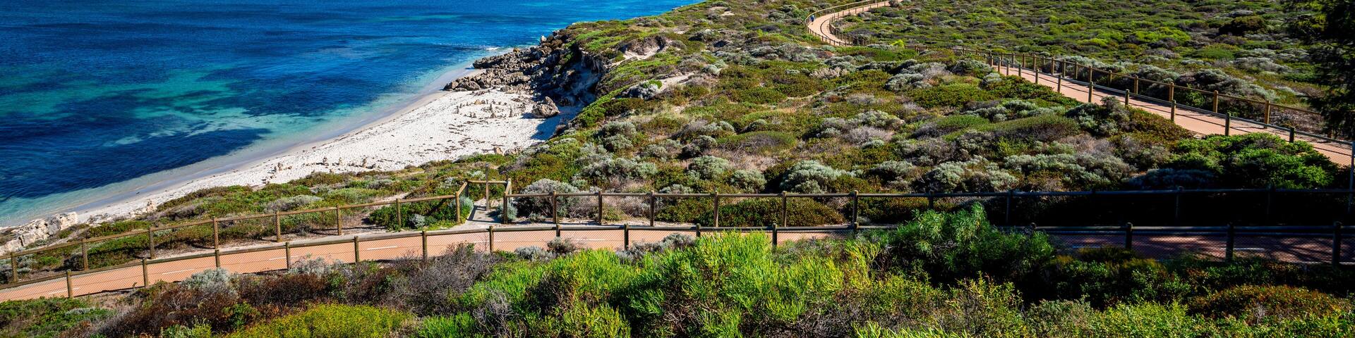 Panoramic View of Coastal Trail Along Scenic Shoreline from Iluka to Burns Beach with Clear Blue Sea and Vibrant Greenery, Perth, Australia, March 2020