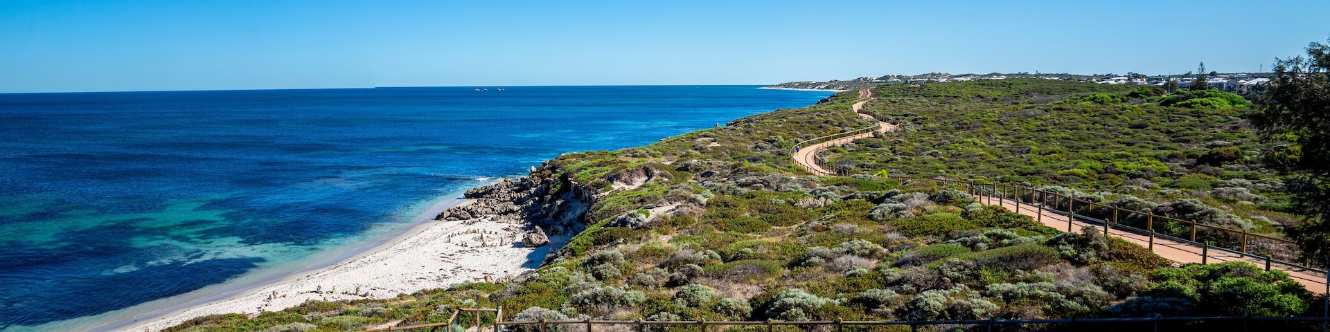 Panoramic View of Coastal Trail Along Scenic Shoreline from Iluka to Burns Beach with Clear Blue Sea and Vibrant Greenery, Perth, Australia, March 2020