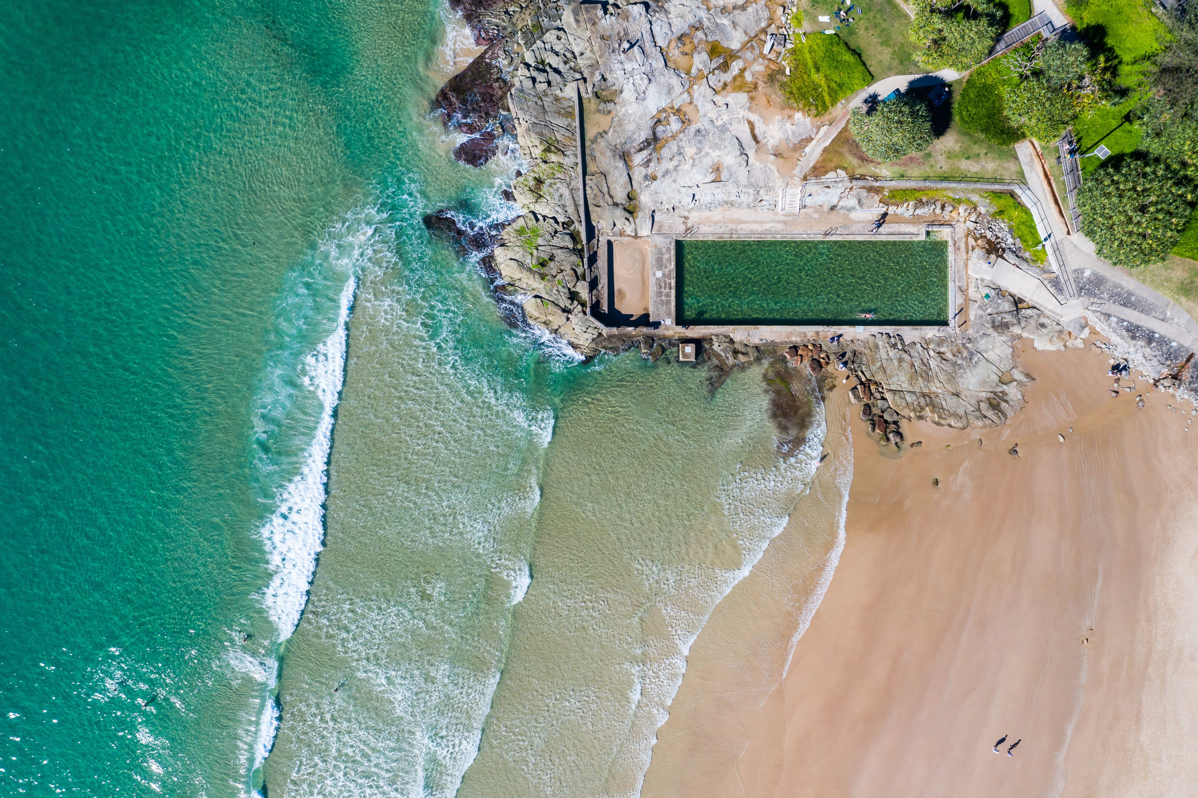 Yamba main beach and ocean pool bath aerial photograph on blue sky sunny day