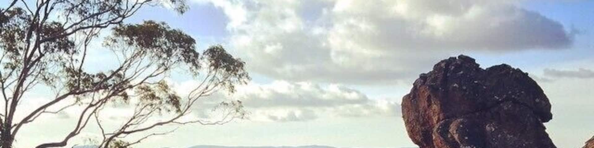 The Macedon Ranges from the top of the Hanging Rock summit on a warm winter day. Go visit The Stables restaurant in Malmsbury while you're out that way.