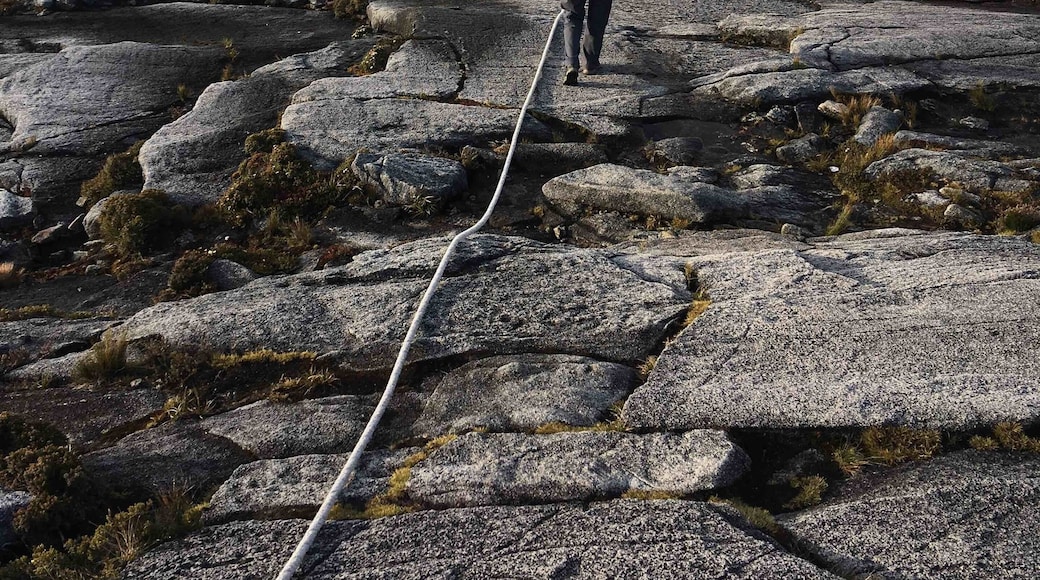 Descending from the summit of Mount Kinabalu shortly after sunrise.