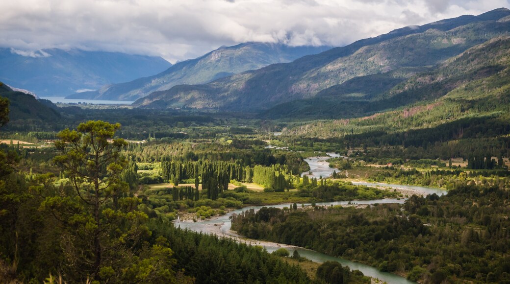 Landscape of Blue river, valley and forest in El Bolson, argentinian Patagonia