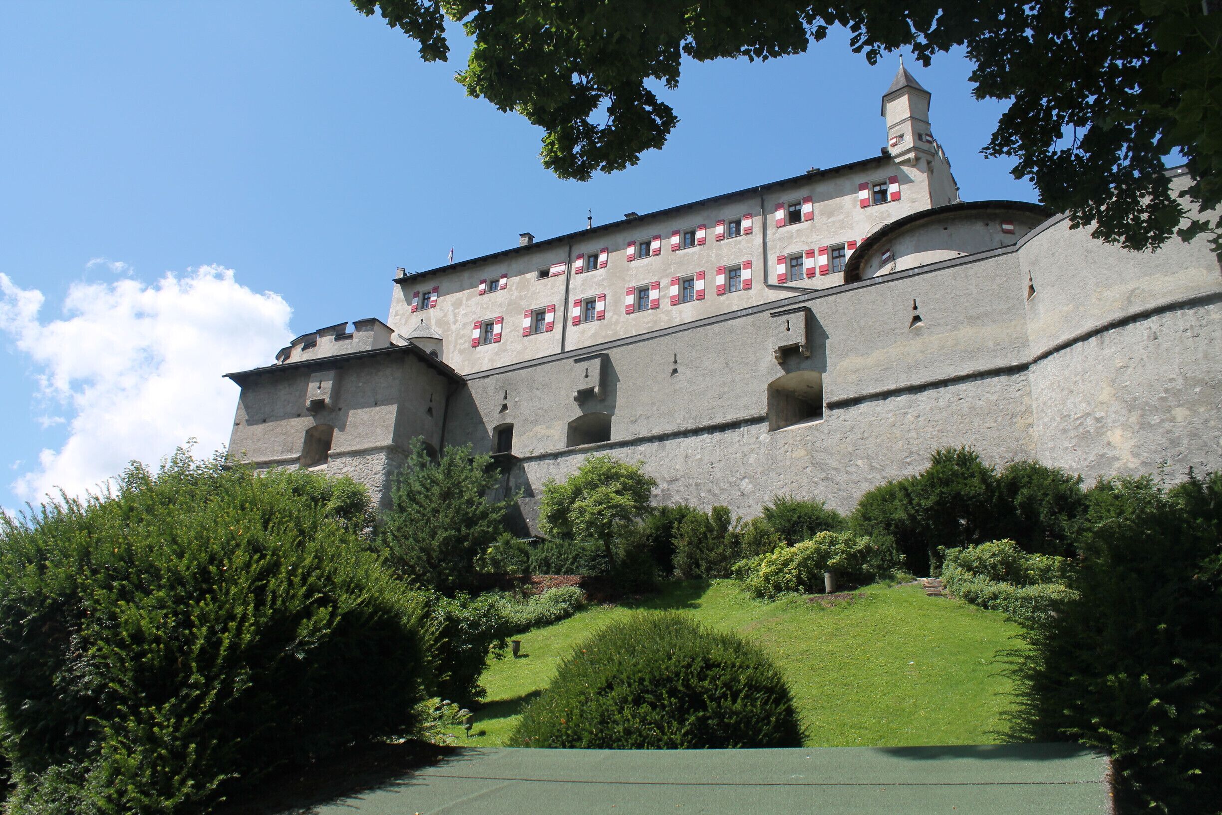 A medieval castle about 30 minutes from Salzburg. It had a cameo roll in the Sound of Music, and played a larger part in Where Eagles Dare. There is a bird of prey show featuring eagles, falcons and even a vulture. A fun time. You can hike up, or take the funicular.