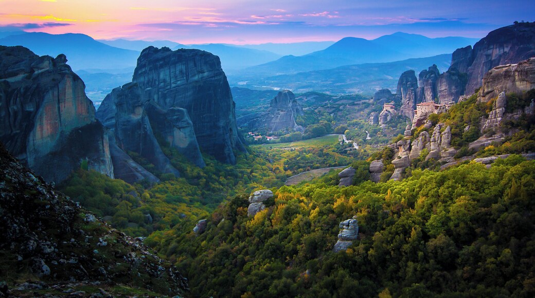 The view of the cliff top monasteries from sunset rock during sunset in Meteora. #trovember #history