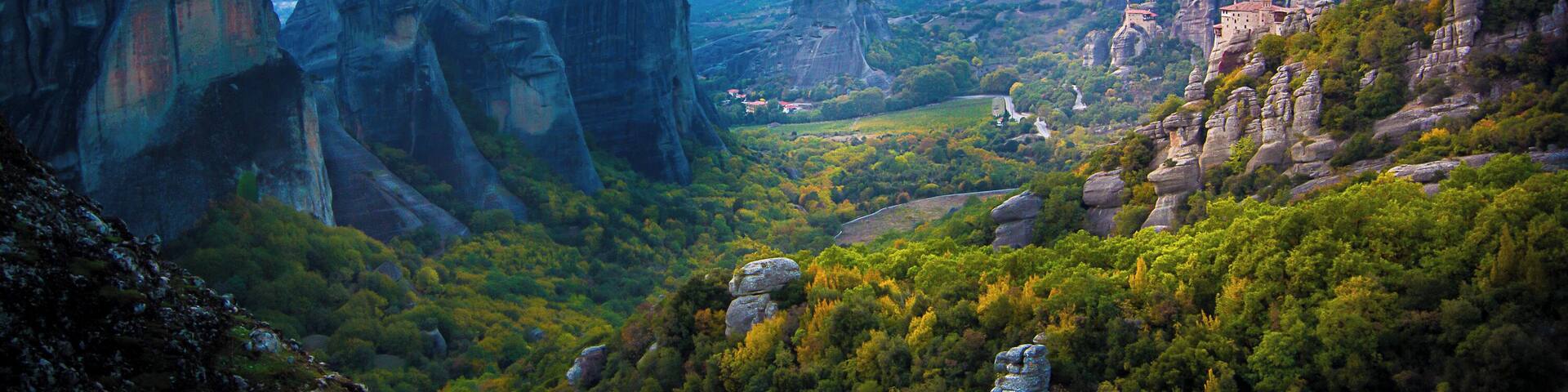 The view of the cliff top monasteries from sunset rock during sunset in Meteora. #trovember #history