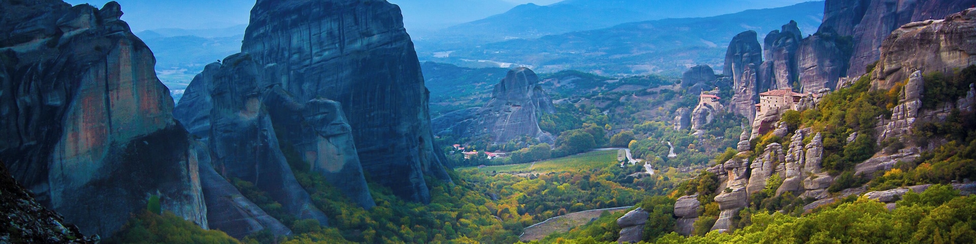 The view of the cliff top monasteries from sunset rock during sunset in Meteora. #trovember #history