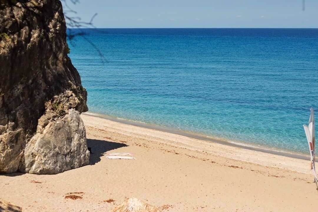 Agioi Saranta beach in Pilio, Greece. Perfect combination of mountain and sea, go in September and enjoy the beach on your own.