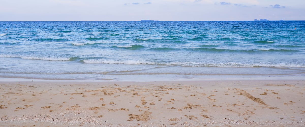Tropical beach seaside and blue sky at Thung Wua Laen Beach in Chomphon province Thailand