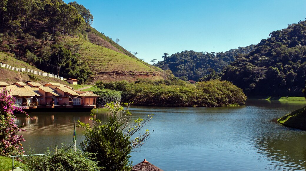 Large dark water lake, with houses and lots of forest around, Barra do Pirai, Rio de Janeiro, Brazil