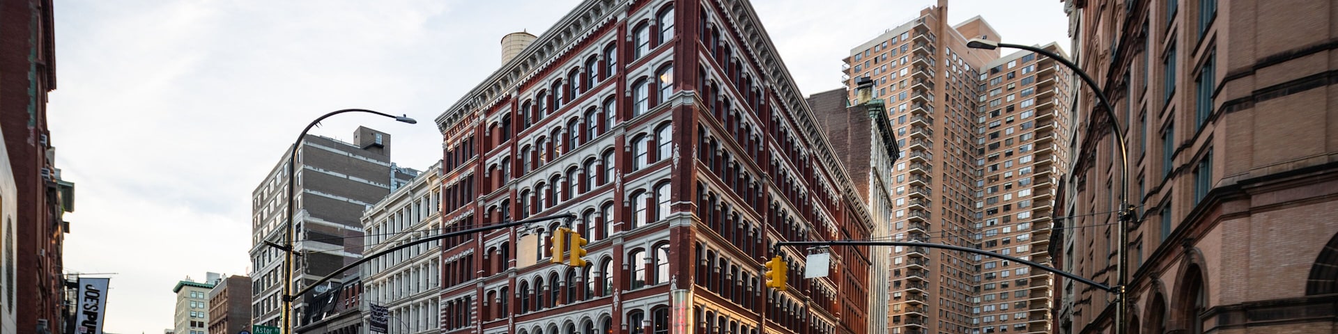 East Village showing street scenes, a sunset and a city
