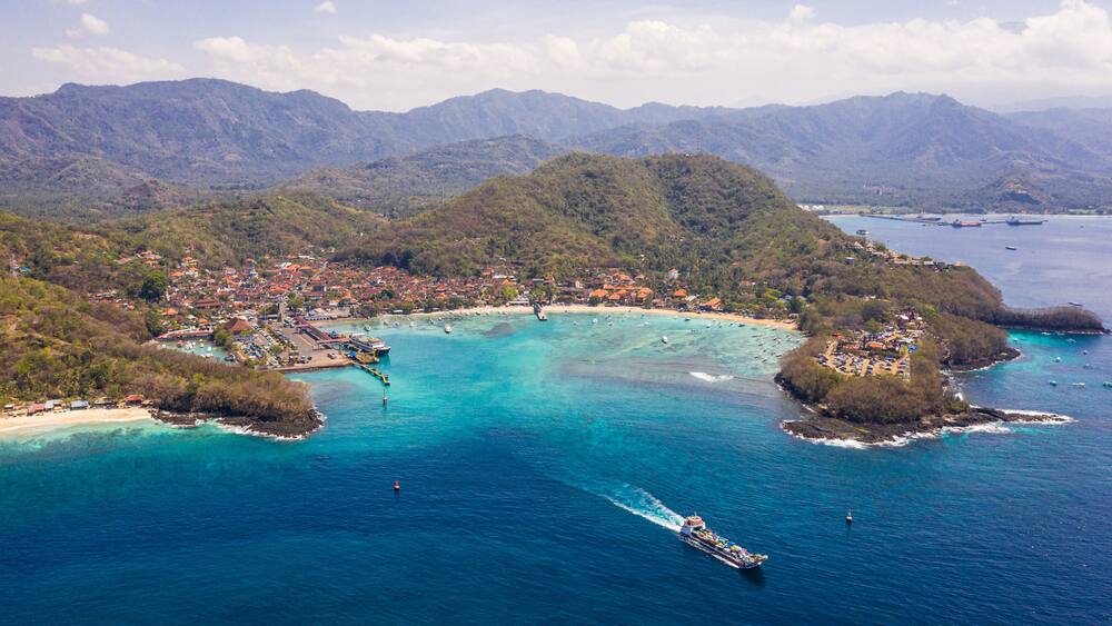 Roro car ferry leaving the Padang Bai harbor in Bali in Indonesia heading to Lombok island
