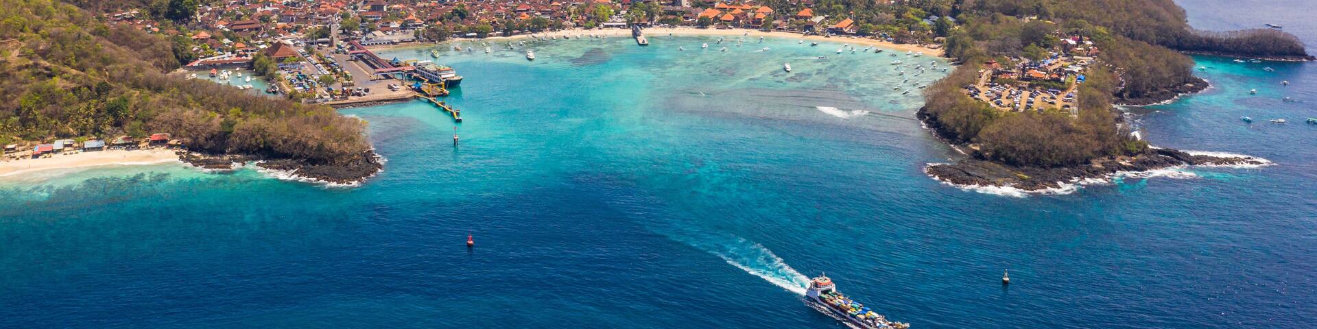 Roro car ferry leaving the Padang Bai harbor in Bali in Indonesia heading to Lombok island