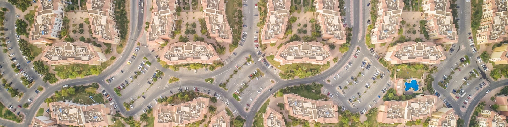 Aerial view of abstract, geometrical Discovery Gardens urban area, Dubai, UAE.