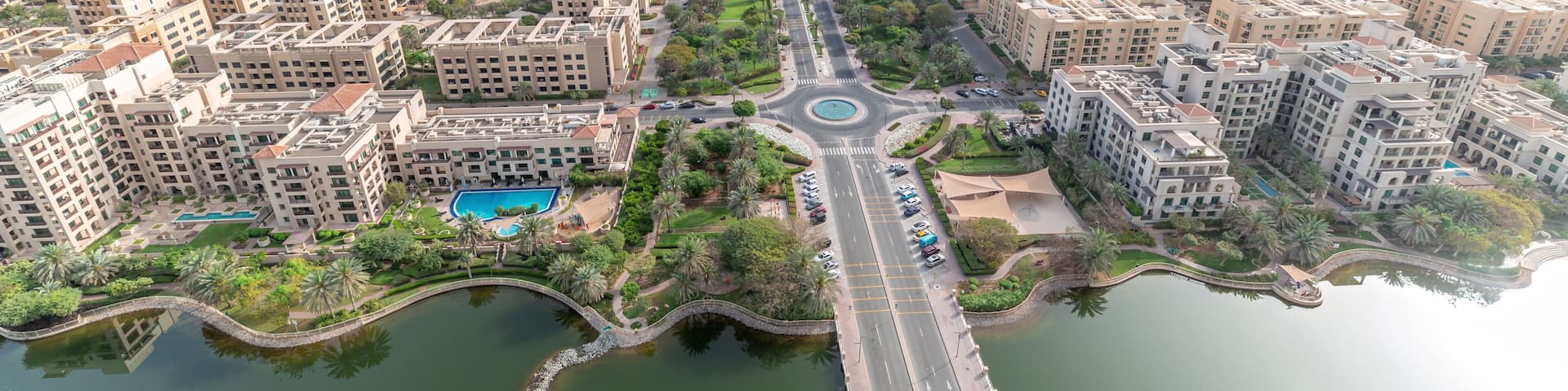 Skyscrapers in Barsha Heights district and low rise buildings in Greens district aerial timelapse. Dubai skyline