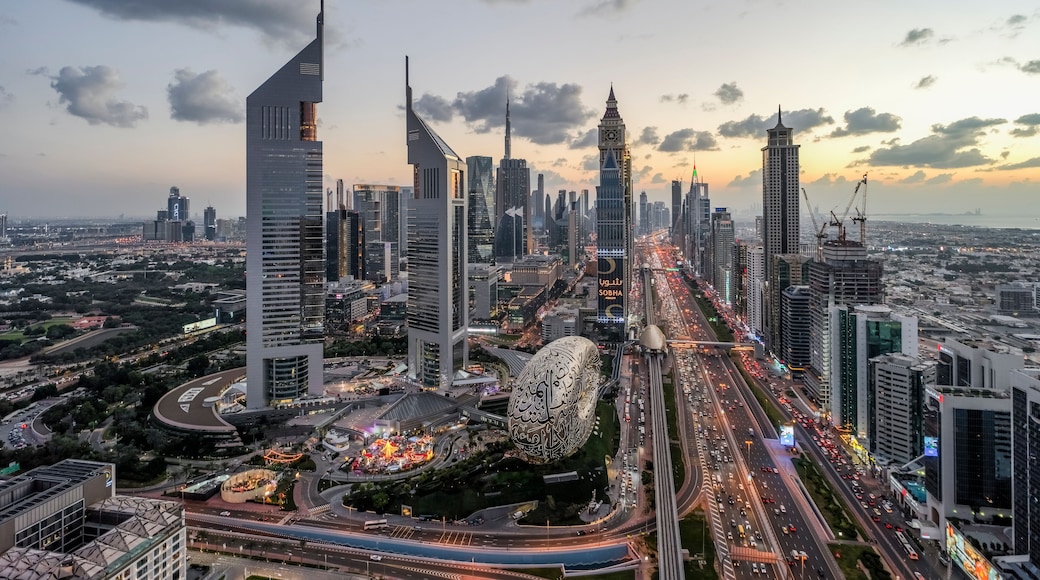 Dubai, Sheikh Zayed Road, United Arab Emirates - 15 December 2023: Aerial view of bustling city lights at evening in Dubai, Sheikh Zayed Road, United Arab Emirates.